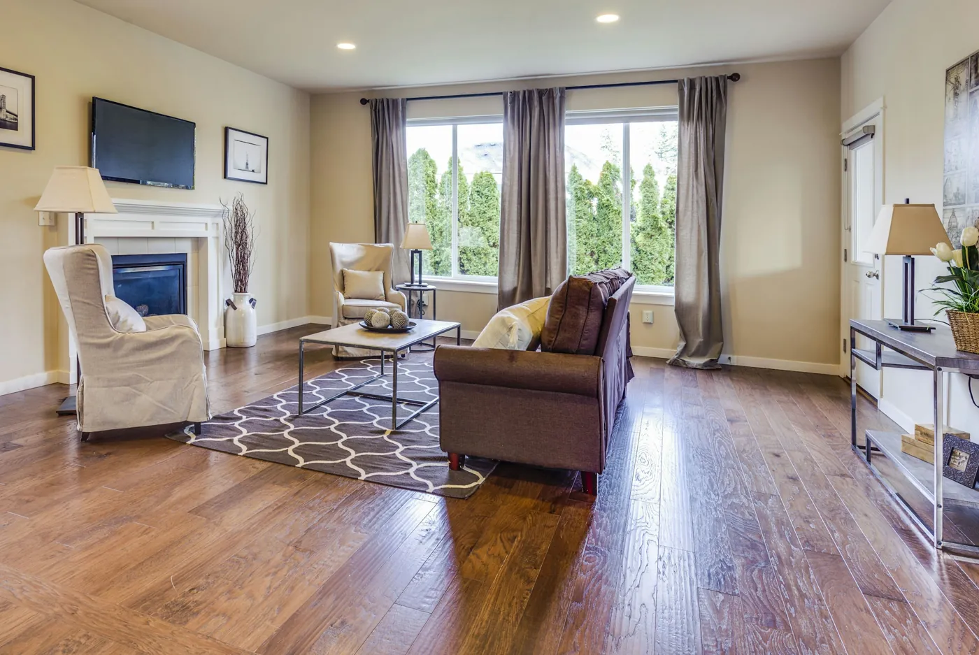 A living room with hardwood floors
